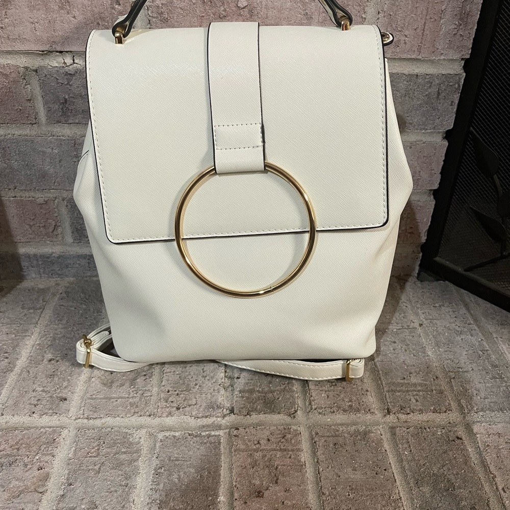 Modern White and Gold Backpack with Circular Detail